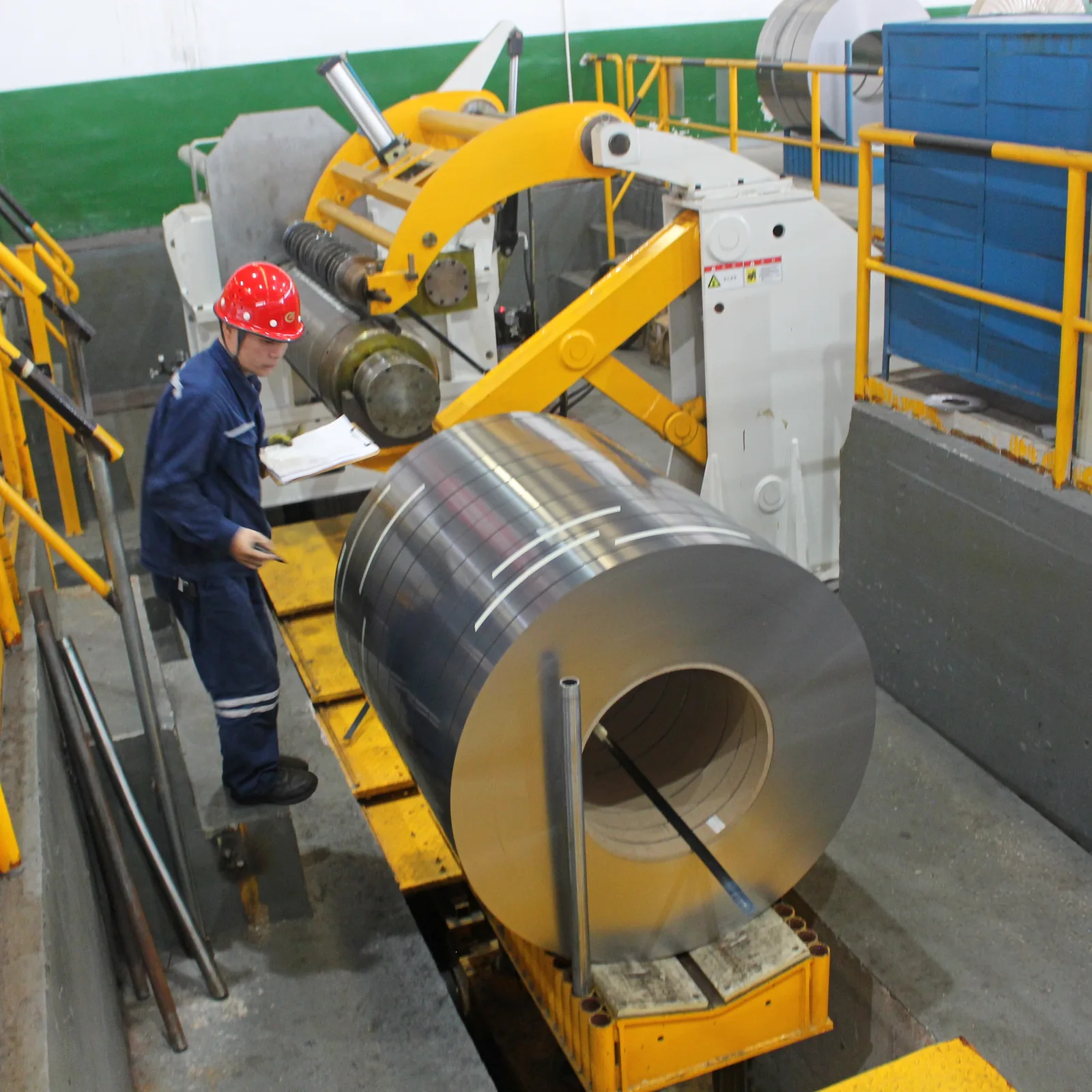 Slitting grain-oriented strip after the grade has been confirmed against the specification.